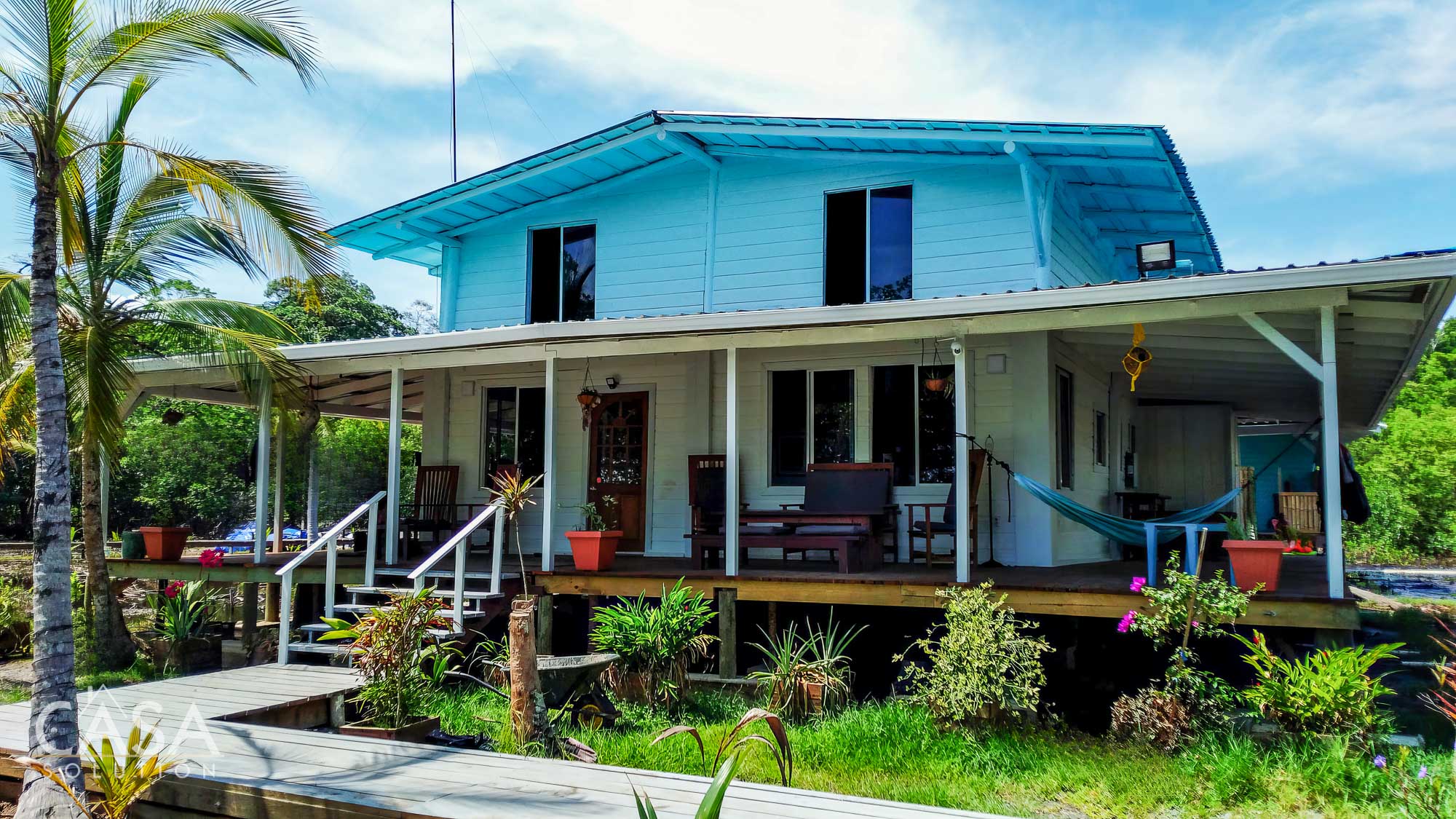 Bocas Del Toro Tropical House on 1-hectare waterfront Lot for Sale on Isla San Cristobal. Sustainable Living with Solar Power, Lodge, and Storage Spaces