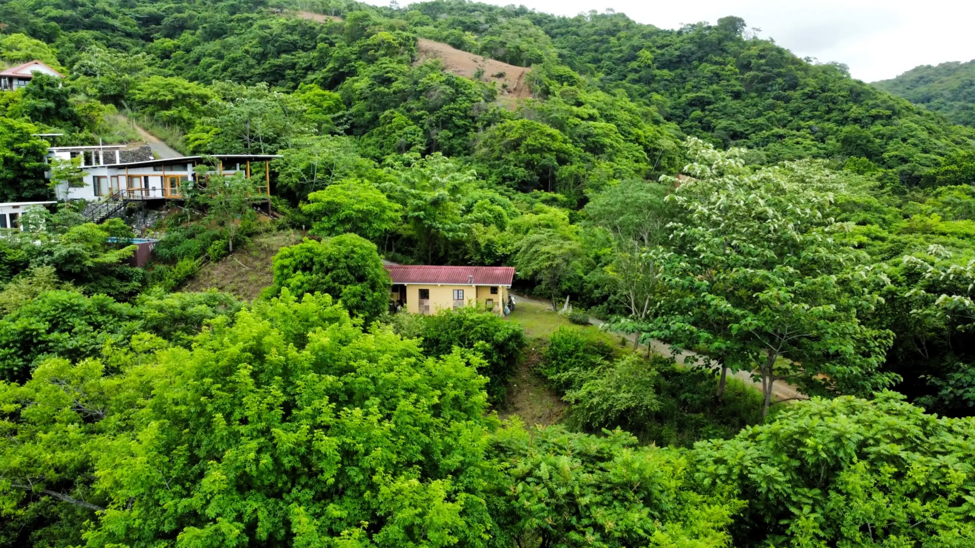 Centrally-Located Lot with 2 Rental Studios for Sale in Los Buzos Area, Cambutal, Panama – Short Walking Distance to The Beach!