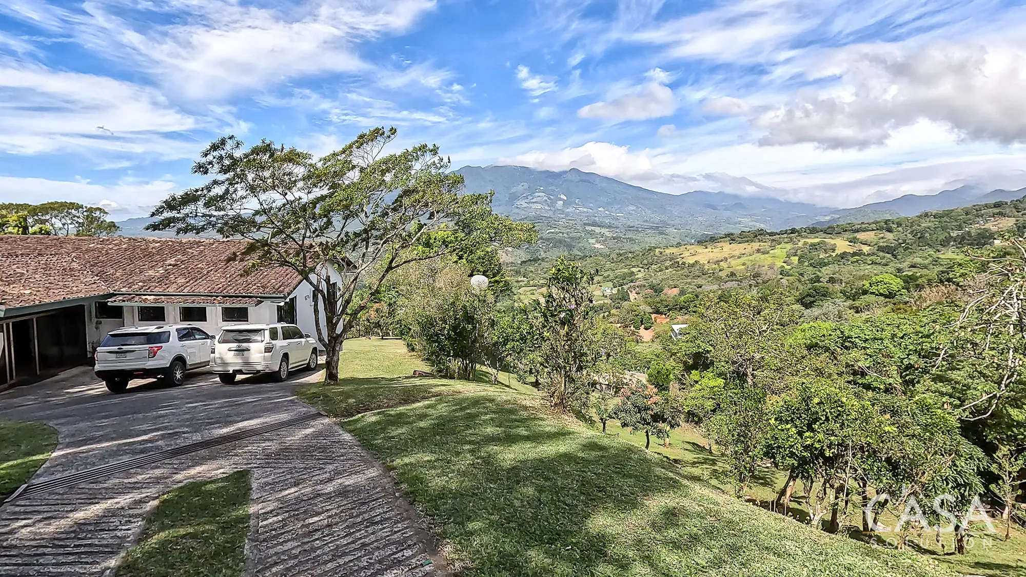Inviting Home with Stunning Views for Sale in Jaramillo, Boquete. With Spacious Living Areas and a Greenhouse