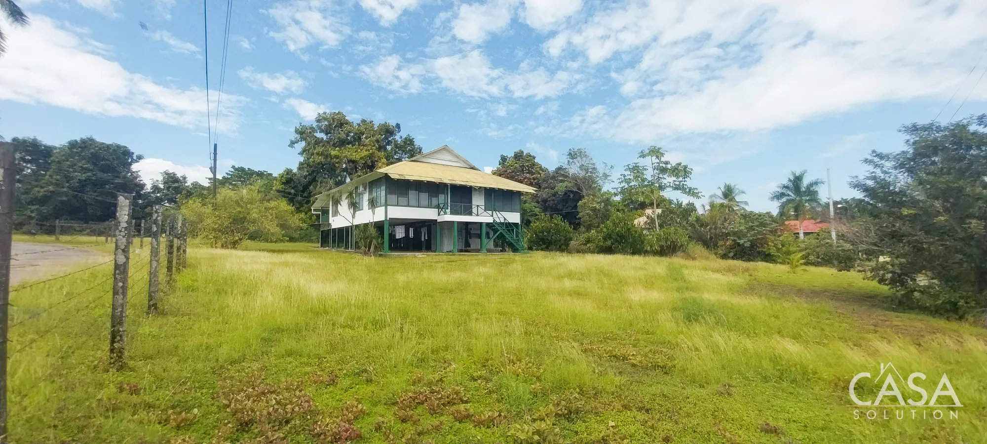 Chiquita Banana 4-bedroom Home on a large lot for Sale in Puerto Armuelles, with fruit trees and views of Eco Amigo Baru Forest Reserve